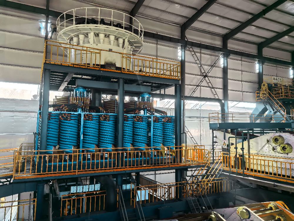What is the primary objective of mineral processing?