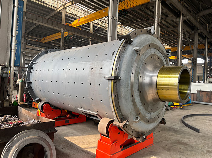 What are the advantages of a grate-type ball mill?